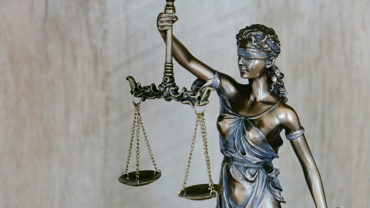 Statue of Lady Justice holding scales